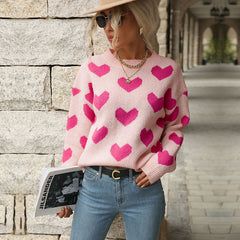 Sweet-style pink crew-neck sweater with a heart pattern