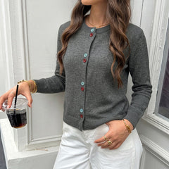 Versatile knit top with colorful buttons