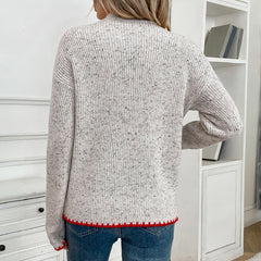 Heart-patterned mock-neck sweater with decorative trim