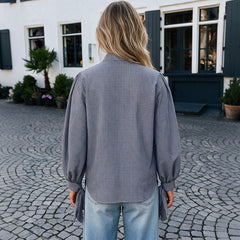 Loose mid-length shirt with side slits