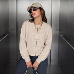 Modern Chinese-style knit jacket with frog closures