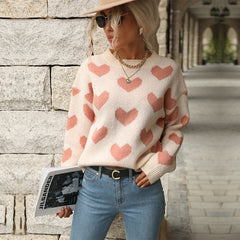 Sweet-style pink crew-neck sweater with a heart pattern