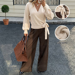 Fitted long-sleeve sweater with a lace-up crossover V-neck