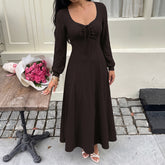 Long-sleeved dress with a tie-waist