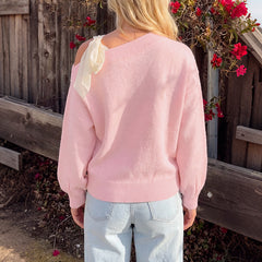 One-shoulder long-sleeve sweater with a bow tie detail