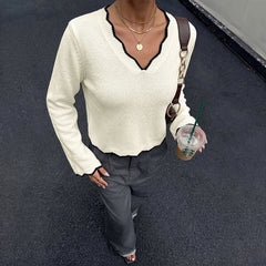 Color-blocked V-neck flared sleeve cropped sweater with wavy trim