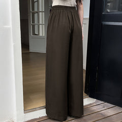 High-waisted wide-leg trousers with a fluid drape