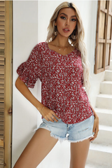 Sidney Bluse mit Blumenmuster und Schimmer-Schößchen