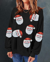 Sweatshirt mit kontrastierenden Pailletten und Weihnachtsmann-Muster