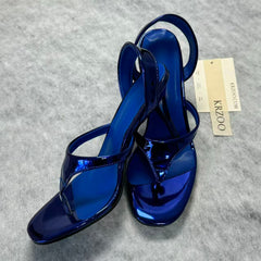 A slip-on toeless open-toe Roman-style shoe
