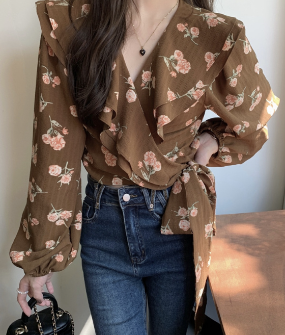 Blusa peplum floral de arándanos escarchados 