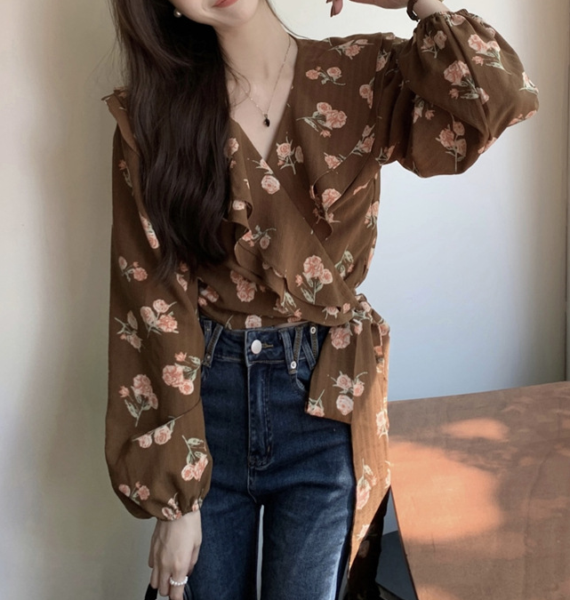 Blusa peplum floral de arándanos escarchados 