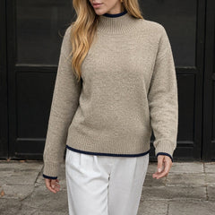 Solid color simple knit sweater with contrasting trim