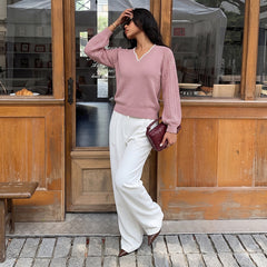 Loose-fit color-block V-neck cutout knit sweater