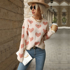 Sweet-style pink crew-neck sweater with a heart pattern