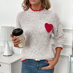 Heart-patterned mock-neck sweater with decorative trim