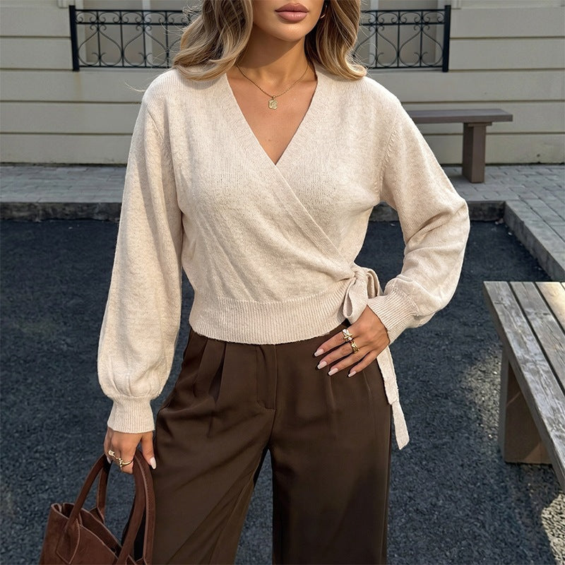 Fitted long-sleeve sweater with a lace-up crossover V-neck