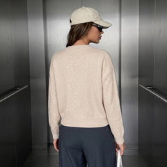 Modern Chinese-style knit jacket with frog closures