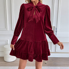 Solid-color velvet dress with a bow-tie collar