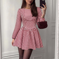Long-sleeve plaid open-back bow dress