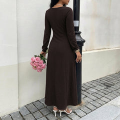 Long-sleeved dress with a tie-waist