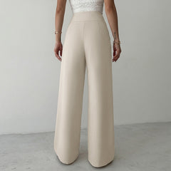 Wide-leg trousers with a gathered waist and metal buckle