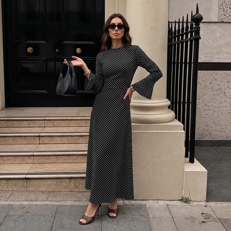 Vintage-style French open-back maxi dress with flared sleeves