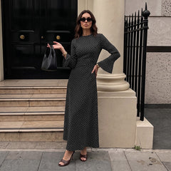 Vintage-style French open-back maxi dress with flared sleeves