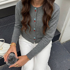 Versatile knit top with colorful buttons