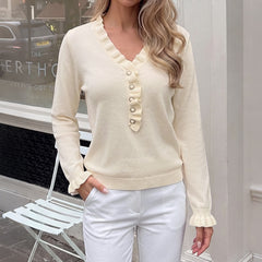 Lettuce-edge V-neck sweater with pearl embellishment