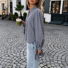 Loose mid-length shirt with side slits