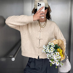Modern Chinese-style knit jacket with frog closures