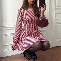 Long-sleeve plaid open-back bow dress