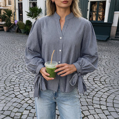 Loose mid-length shirt with side slits