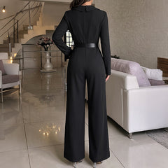 High-waisted belted jumpsuit with a slit