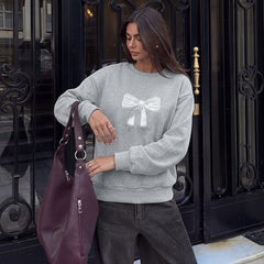 Oversized crew neck sweatshirt with bow and dropped shoulders