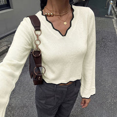 Color-blocked V-neck flared sleeve cropped sweater with wavy trim