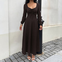Long-sleeved dress with a tie-waist