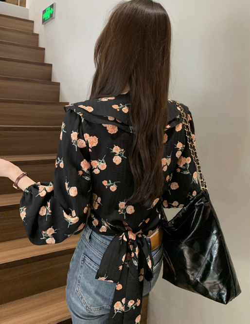 Blusa peplum floral de arándanos escarchados 