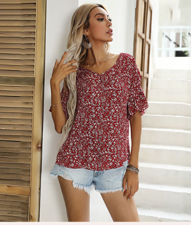 Blusa peplum brillante con estampado floral Sidney 