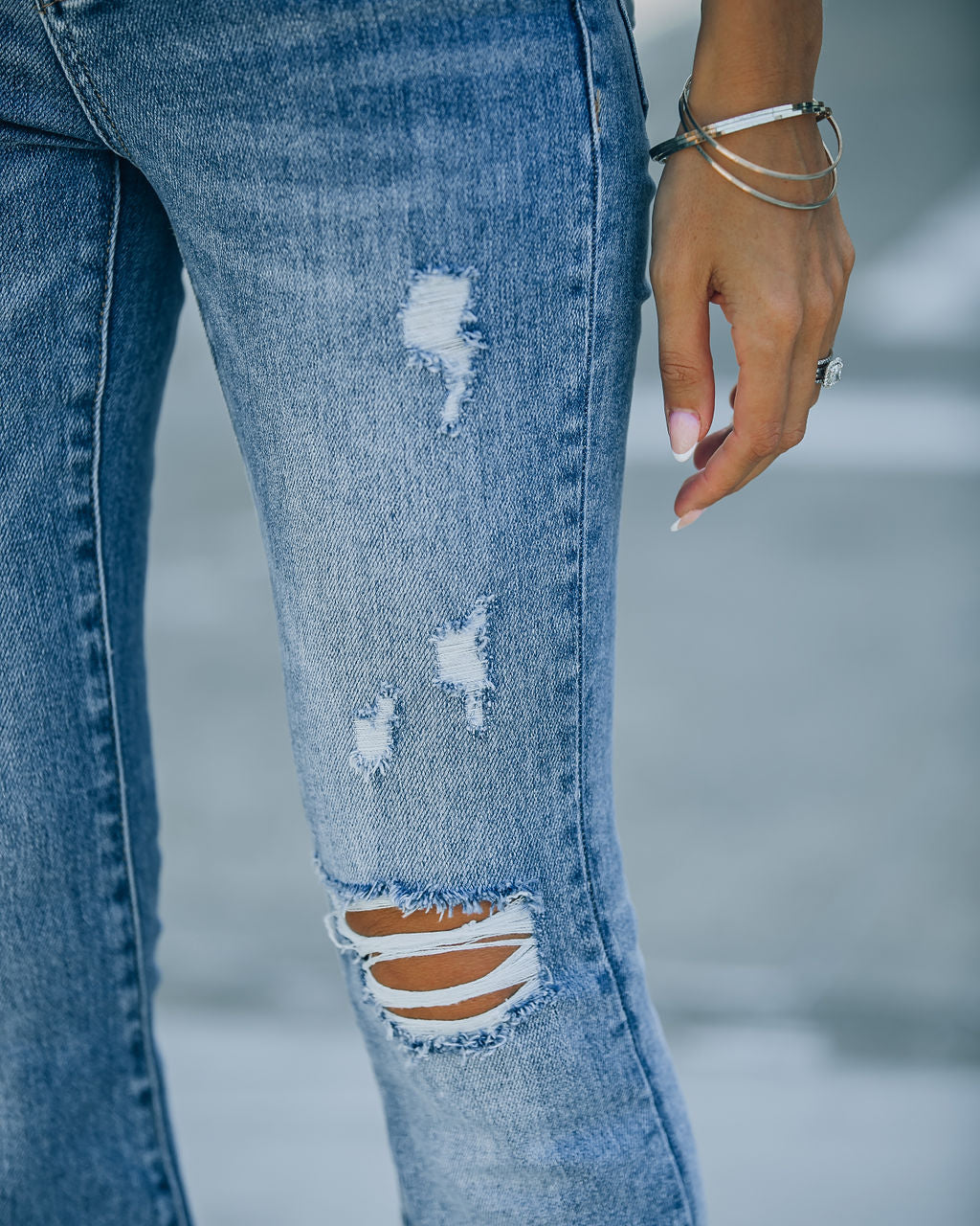 Amber High Rise Distressed Flare Denim