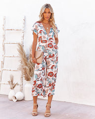 Hollow Floral Pocketed Tie Jumpsuit Oshnow