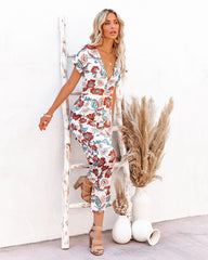 Hollow Floral Pocketed Tie Jumpsuit Oshnow