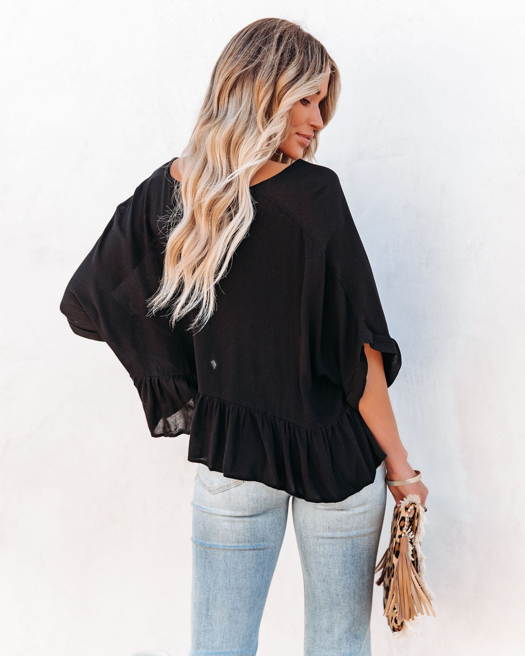 Raisa Relaxed Peplum Top - Black Oshnow