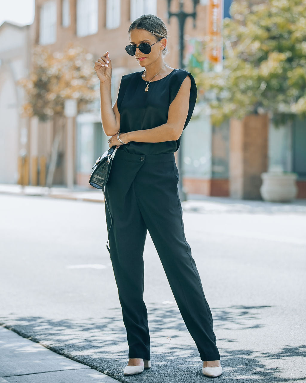 Uncommon Times Pocketed Asymmetrical Button Pants - Black Oshnow